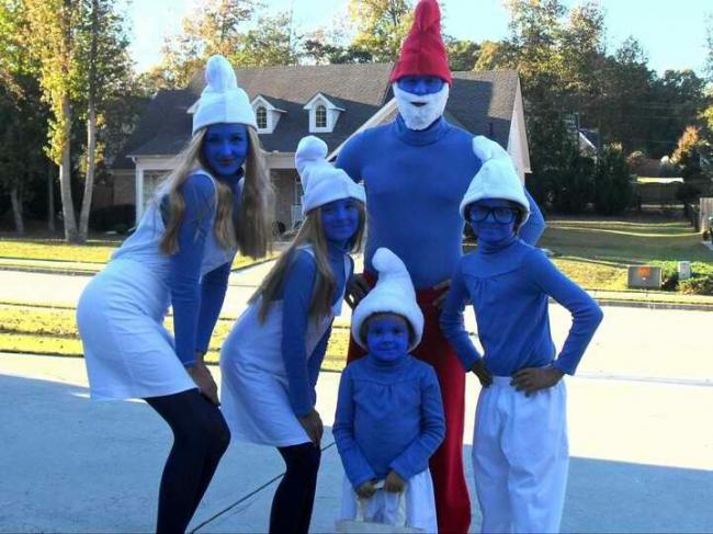 A Family Wearing Homemade Smurf Costumes